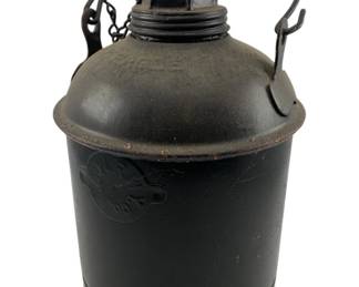 746 - New Eagle Vintage Railroad Oil Can 10"x16.5" (Description): New Eagle vintage railroad oil can featuring a bail handle and chained screw cap. This utilitarian piece showcases the classic design used for transporting and dispensing oil in railroad operations. Measures 10 inches by 16.5 inches.