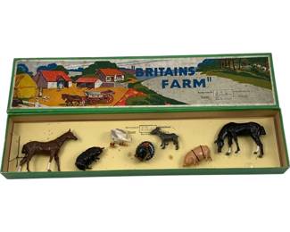 1176 - Britains Farm Metal Animal Set in Box (Description): Britains Farm metal animal set in original box. The set includes painted lead farm animals featuring horses, pigs, a dog, a rooster, and a duck. The box features a colorful lithographed lid depicting a charming English farmyard scene. Manufactured by W. Britain in London, England.