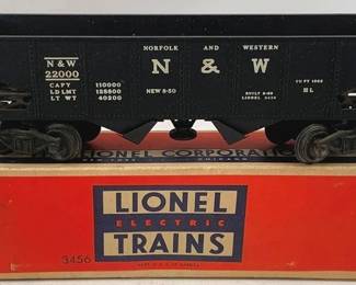 914 - Lionel #3456 N&W Hopper Car w/ Box O Scale (Description): Lionel #3456 Norfolk and Western hopper car in O scale, complete with original orange Lionel Electric Trains box. The black hopper car features white lettering with N&W 22000 markings and detailed railroad specifications on the side. Measures 3 x 4 x 2.5 inches.
