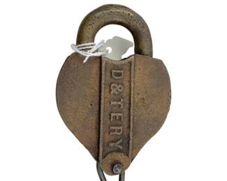 607 - Detery Padlock w/Key 4"x2.5" (Description): Detery padlock with key. The padlock features the D&TERY maker's mark embossed on the body. Measures 4 inches by 2.5 inches.