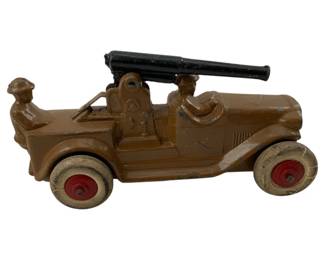 720 - Barclay Manoil Cast Lead Gun Truck (Description): Barclay Manoil cast lead anti-aircraft gun truck. This vintage toy military vehicle features a mounted anti-aircraft gun and soldier figures. Measures 2" x 4" x 1.5".