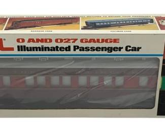 848 - Lionel Wilson Passenger Car O Scale in Box (Description): Lionel Wilson Passenger Car in O and 027 Gauge. This illuminated passenger car comes in its original box featuring the classic Lionel branding. The car appears in a maroon/burgundy color scheme typical of vintage passenger cars.