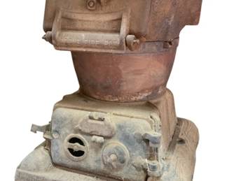 449 - Antique Cast Iron Caboose Stove 28"x22"x32" (Description): Antique cast iron caboose stove featuring a traditional design with a fire pot and ventilation controls. The stove shows authentic aged patina consistent with its age. Measures 28 inches wide by 22 inches deep by 32 inches tall.