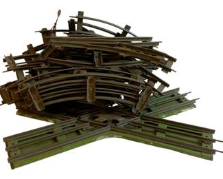 1070 - Lot O Scale Metal Train Tracks (Description): A lot of O scale metal train tracks. The collection includes various track pieces suitable for model railroad layouts.