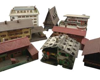 370 - Group Lot of Model Train Houses (Description): Group lot of model train houses. This collection includes multiple miniature buildings suitable for model train layouts and dioramas.