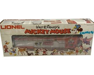 1036 - Lionel Mickey Mouse Locomotive O Scale (Description): Lionel Mickey Mouse Locomotive in O Scale, complete with original box. This Walt Disney's Mickey Mouse Express locomotive features Disney character graphics on the packaging and showcases the classic Lionel branding.