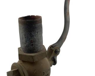 624 - Vintage Brass Gate Valve 12"x10"x4" (Description): Vintage brass gate valve featuring a curved lever handle. The valve body is marked with manufacturer information. Measures 12 inches by 10 inches by 4 inches.