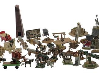 345 - Group Lot of Model Train Display Items (Description): Group lot of model train display items. This collection includes various miniature accessories and scenic pieces designed for model train layouts.