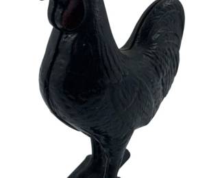 304 - Vtg Cast Iron Rooster Piggy Bank 5"x4"x1" (Description): Vintage cast iron rooster piggy bank. This charming piece features the classic form of a rooster and functions as a coin bank. Measures 5" x 4" x 1".