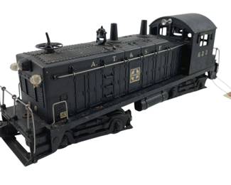 336 - Lionel Model Locomotive 4"x12"x2.5" (Description): Lionel model locomotive. Measures 4 inches by 12 inches by 2.5 inches.