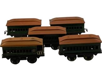 1124 - Vtg Tin Litho Green Passenger Train Cars Toy (Description): Set of five vintage tin lithograph passenger train cars in green with orange-painted clerestory roofs. Each car features stamped window details and rolls on four wheels. The cars include coupling hooks for connecting. Measures 2 inches.