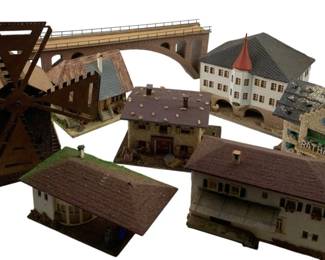 360 - Group Lot of Model Train Display Houses (Description): Group lot of model train display houses. This collection includes various architectural structures suitable for model train layouts and dioramas.