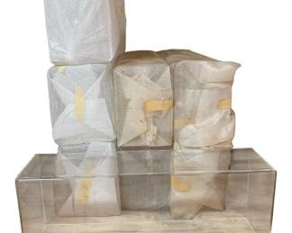 436 - Group Lot of 8 Plexi-glass Display Covers (Description): Group lot of eight plexi-glass display covers. Each cover measures 6 inches by 16 inches by 4.25 inches.