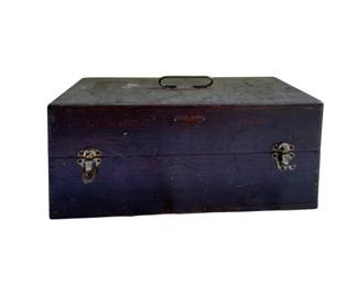 697 - Wooden W.M. Meyers Box 8"x17"x8" (Description): Wooden W.M. Meyers box featuring dovetail joinery, metal clasps, and a top handle. The box displays a dark stained finish with a small metal nameplate on the front. Measures 8 inches by 17 inches by 8 inches.