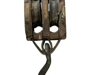 489 - Antique Wood & Iron Double Pulley w/ Hook (Description): Antique pulley featuring a wooden double block construction with iron hardware and a large hook. The piece shows authentic age and patina consistent with its vintage origins. Measures 15" x 4" x 4".