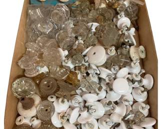 479 - Box Lot of Glass & Porcelain Knobs (Description): A box lot of glass and porcelain door and drawer knobs. The collection includes a variety of styles and sizes suitable for furniture and cabinetry hardware.