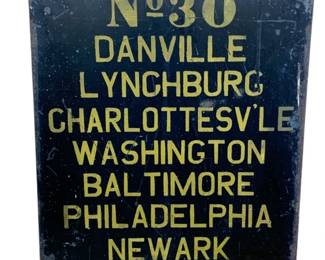945 - Metal No. 30 Line Train Sign 20"x16"x1.25" (Description): A metal train sign for the No. 30 Line, listing destinations including Danville, Lynchburg, Charlottesville, Washington, Baltimore, Philadelphia, Newark, and New York. The sign features yellow lettering on a dark background with mounting holes at the top corners. Measures 20 inches by 16 inches by 1.25 inches.