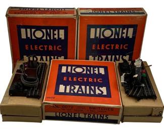 1103 - 3pc Lot Lionel #0072 OO Scale Track Switches (Description): A three-piece lot of Lionel #0072 OO scale track switches in their original boxes. These vintage Lionel Electric Trains remote control switches are designed for OO gauge 3-rail track, with the set including one right and one left switch. The classic orange and blue Lionel boxes show typical age-related wear consistent with vintage train collectibles.