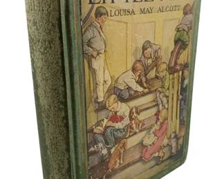 139 - 1928 Little Men by Louisa May Alcott (Description): Little Men by Louisa May Alcott, 1928 copyright edition. This hardcover book features a green cloth spine and an illustrated cover depicting children playing on porch steps with dogs. The cover illustration is in color with period-appropriate artwork. The book shows age-related wear consistent with its vintage status.