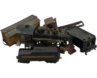 1201 - Lot Assorted Vintage Model Trains AS IS (Description): Lot of assorted vintage model trains sold as is. The collection includes a black steam locomotive with gold trim detailing, a Norfolk and Western tender car in black with gold and red striping, a metal box car marked C.B. & Q. R.R., and additional train components and parts. The pieces show age-appropriate wear consistent with vintage model railroad items. Sold as is condition.