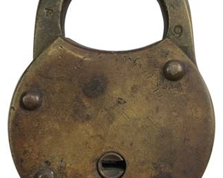 693 - Antique Brass Padlock w/o Key 2.75"x2" (Description): Antique brass padlock without key. This classic rounded padlock features a sturdy shackle and visible rivet construction with four decorative dome rivets on the face. The body shows a beautiful aged patina consistent with age and use. A rotating keyhole cover sits at the center of the lock face. Measures 2 3/4 inches by 2 inches.