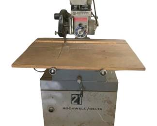 1341 - Rockwell/Delta 10" Deluxe Radial Arm Saw (Description): 59 x 32 x 33 Used as is electric/electronic/mechanical item. No guarantee all components, untested.