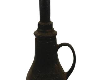 876 - Vtg Norfolk & Western Railway Diner Oil Can (Description): Antique Norfolk & Western Railway Diner oil can or cruet crafted from cast iron with a dark patina. This utilitarian piece features a tapered body with a single loop handle and a tall narrow neck with a cork stopper. The surface shows aged wear consistent with its railroad heritage. Measures 10" x 5".