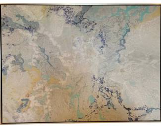 150 - Large Abstract Canvas Art in Frame 60"x82" (Description): Large abstract canvas artwork presented in a slim gold-tone frame. The piece features a soft, ethereal composition with flowing forms in muted tones of cream, beige, gray, teal, and touches of blue and yellow. The painterly surface displays organic, marbled patterns reminiscent of aerial landscapes or natural geological formations. Measures 60 inches by 82 inches.