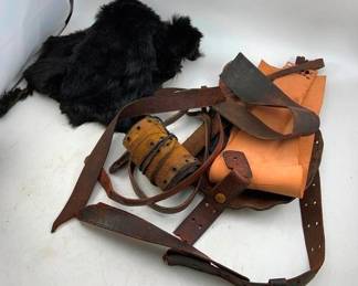 792 - Group Lot of Old Leather & Fur (Description): A group lot of old leather and fur pieces. The collection includes various leather straps, pieces, and remnants in different colors and conditions, along with fur material. Suitable for crafting, restoration projects, or collecting.