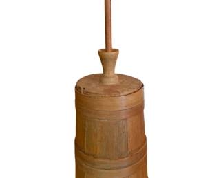 33 - Antique Wooden Butter Churn w/ Dasher 41"x11" (Description): Antique wooden butter churn with original dasher and lid. This stave-constructed churn features a tapered barrel design held together with wooden bands. The churn retains its warm, aged patina throughout. Complete with the original plunger-style dasher that extends through the fitted lid. Measures 41 inches tall (including dasher) by 11 inches in diameter.
