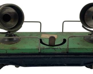 297 - Vtg Lionel No. 2920 or 820 Search Light Car (Description): Vintage Lionel No. 2920 or No. 820 search light car. This model train car features dual search lights mounted on a flatbed base. Measures 4" x 3" x 9". Used as is electric/electronic/mechanical item. No guarantee all components, untested.
