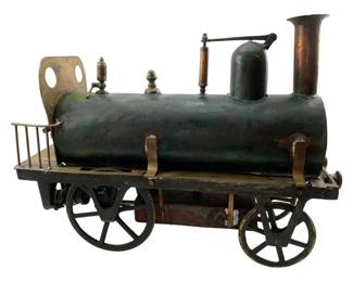 15 - Birmingham Dribbler Live Steam Locomotive (Description): A "Birmingham Dribbler" live steam locomotive model crafted in brass and copper. This charming antique-style engine features a dark green painted cylindrical boiler with brass fittings, decorative finials, a copper smokestack, and spoked wheels. Ther platform includes a protective railing and brass backplate. Measures 11" x 15" x 5".