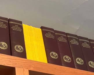     Bound National Geographic Magazine library volumes (the maroon hardbound books).