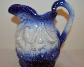 Blue and white pitcher