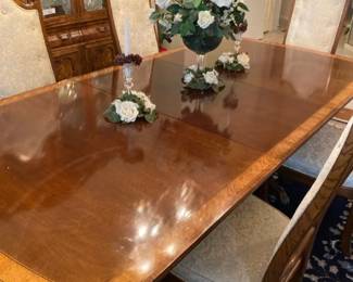 A Drexel Heritage Mahogany Dining Table With Six Chairs And Three Leaves