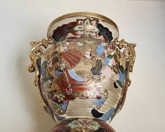 Raised gilt 'Moriage' accents...on this Japanese Satsuma ware vase. 