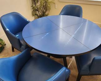 Mid-Century Modern Blue Dining Table and Blue Leather Swivel Chairs. 