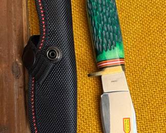 Steel Warrior Buck Skinner Fixed Blade Knife with Green Textured Handle and Nylon Sheath