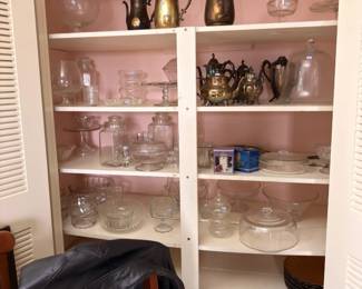 Cupboard full of glassware, crystal and silver