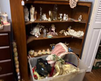 Bookcase of porcelain figurines and collectibles