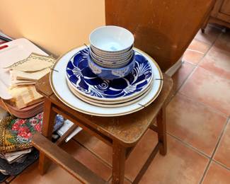 Blue and white china bowls on antique chair