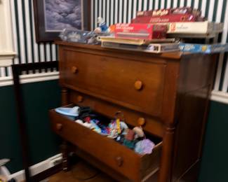 Antique chest of drawers and framed art