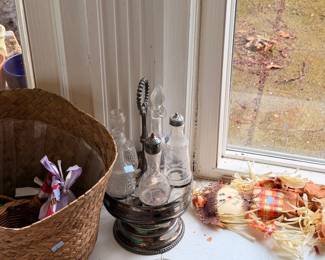 Silver decanter set and woven basket