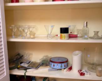 Shelves of glassware, vases and decor