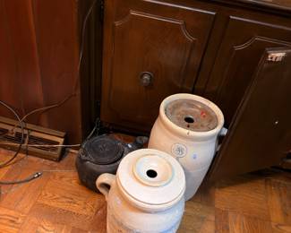 Antique stoneware crocks and churn