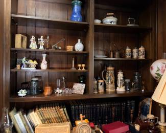 Shelves of figurines, beer steins and collectibles