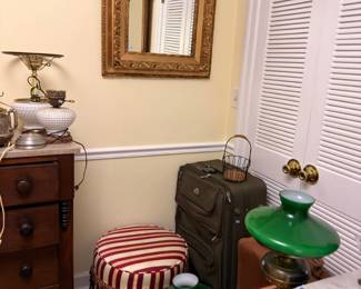 Green glass parlor lamps and gilt mirror