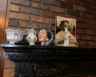 Porcelain creamers, Toby jug and figurine on mantel