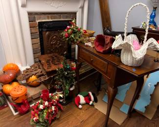 Seasonal decor, wicker basket and side table