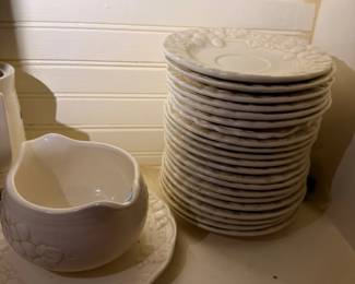 Stack of white ironstone plates and bowl